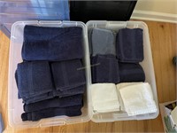 Two totes of bath towels