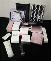 Makeup bags, eyelash kit, and Mary Kay cosmetics