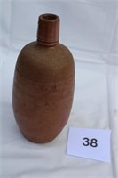 EARLY CLAY POTTERY BOTTLE