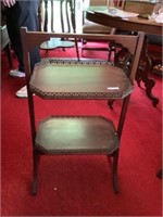 Antique mahogany two shelf table w brass rim