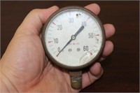 A Vintage Oil Gauge