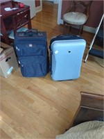Two rolling suitcases . Very nice and clean