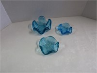 Beautiful colored glass dishes; possibly votive