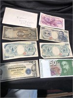 Box full of foreign currency mostly World War II