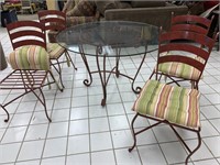 Glass top decorative table & 4 chairs w/cushions