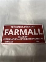 Cast iron Farmall sign 9.25”x 4.5”