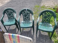 3 plastic outside chairs
