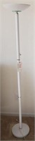 Lot #2110 - White metal torche style floor lamp