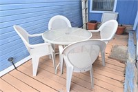 Glass Top Patio Table & Plastic Patio Chairs