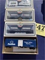 4 HO gauge train cars
Penn State box, Clara,