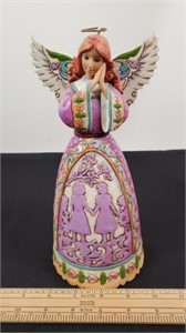 Jim shore, colorful figurine.