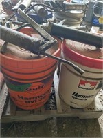Old grease guns, part  pails of oil