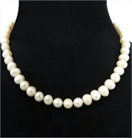 17 1/2" STRAND OF OVAL OR EGG SHAPED WHITE PEARLS