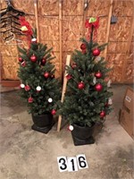 2 4' decorated Christmas trees