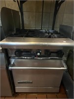 industrial grade stove w/ four stoves &