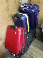 Lot of 4: 3 suit cases, 1 large bag with clothes,