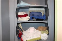 Towels, hangers, cane, heat pad