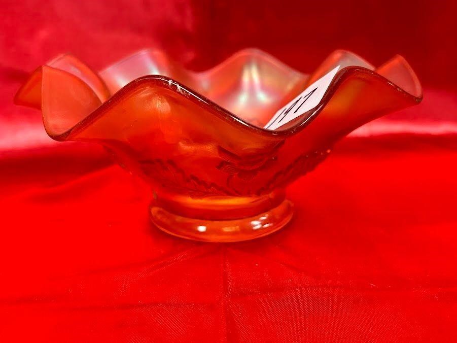 Dugan Daisy Carnival glass bowl, iridescent orange