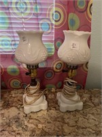 PAIR OF WHITE LAMPS ONE GLOBE IS CHIPPED