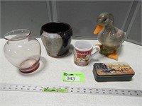 Duck figurine, planter, vase and a tin