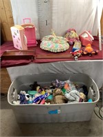 Large tub filled with dolls, Barbies, stuffed
