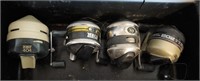 tackle box w/ 4 reels and assorted bobbers