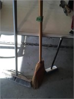 2 brooms, rake, scrub brush