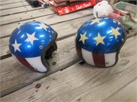 2 motorcycle helmets