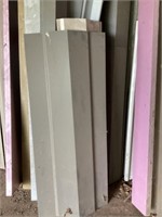 Miscellaneous metal trim between pink foam