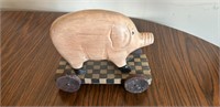 old pink wood pig pull toy