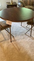 40” x 28” round table with 2 chairs