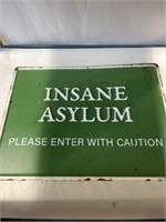 Insane Asylum metal sign 16”x12”