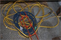 2 extension cords and cord reel
