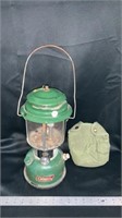 Coleman lantern with canteen belt holder, both