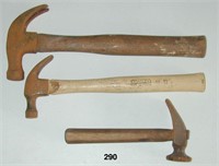 Three rusty hammers