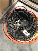 Rolls of extension cords--black, orange, yellow,