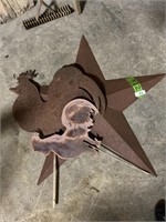 Metal star and rooster cutouts.