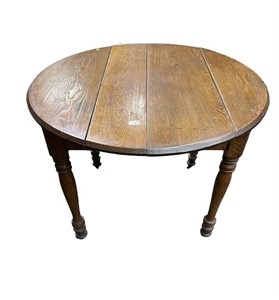 Round Oak Table, 39.25 Diameter, caster off of