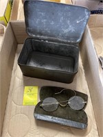 Vintage tin box with vintage eyeglasses