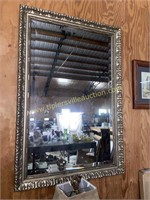 Gold tone mirror