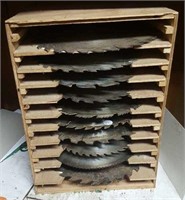 10 saw blades in wooden rack