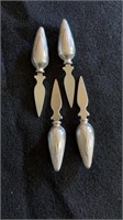 4 four sterling silver handled corn cob holders,
