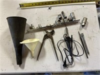 funnels, locking pliers, soldering iron...