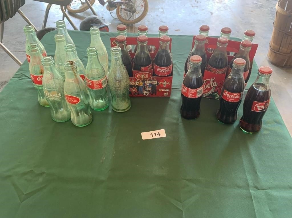 Assorted Coca-Cola Bottles - Some Filled