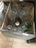 glass bottle in wooden box