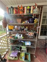 Metal shelf with all gardening, tools and
