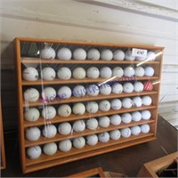 Golf balls in showcase