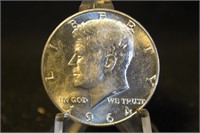 1964-D Uncirculated Kennedy Silver Half Dollar