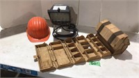 Hard hat, work light, and tackle box