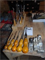 Lot of wood chisels, knives and planes